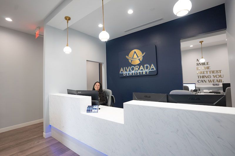alvorada dentistry smiling front desk team member